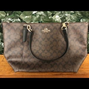 Brown and Black classic Coach Hand Bag
